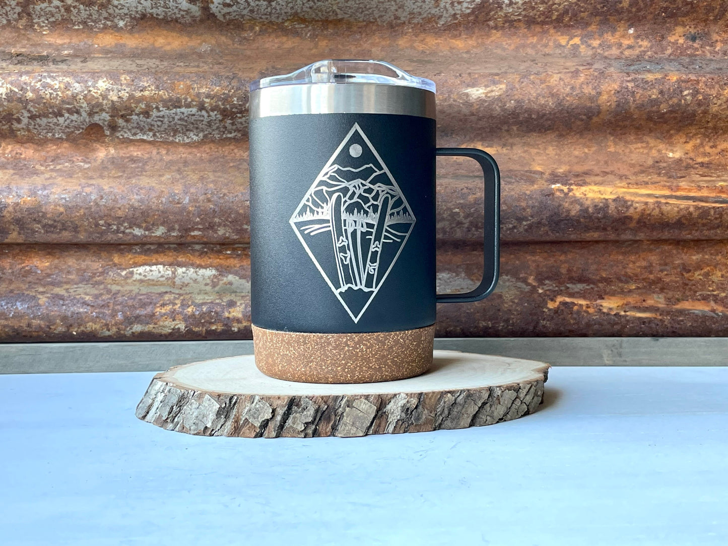 Insulated Cork Bottom Coffee Mug - Skis in the snow with mountains etched 16 OZ - Option to Personalize - BLACK